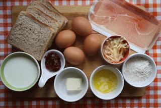 Zdjęcie - jajka zapiekane pod beszamelem - Przepisy kulinarne ze zdjęciami