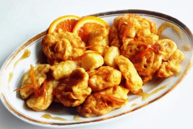 Zdjęcie - Jabłka w pomarańczowym  cieście - Przepisy kulinarne ze zdjęciami