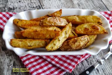 Zdjęcie - Pieczone ćwiartki ziemniaków - Przepisy kulinarne ze zdjęciami