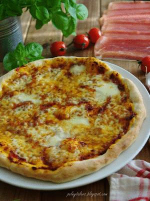 Zdjęcie - Pizza z rukolą,pomidorkami i prosciutto - Przepisy kulinarne ze zdjęciami