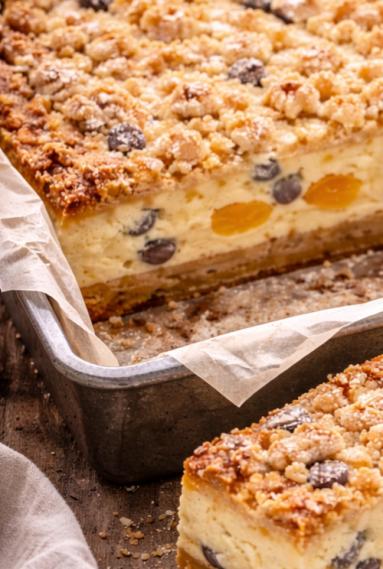 Zdjęcie: Sernik z brzoskwiniami i kruszonką Zdjęcie - Sernik z brzoskwiniami i kruszonką - Przepisy kulinarne ze zdjęciami